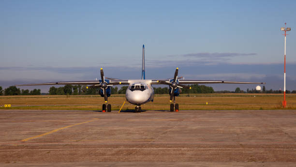 Ukrainian aircraft AN - 26 B. Plane Antonov AN-26b at airport. Ukrainian aircraft AN - 26 B. Plane Antonov AN-26b with propeller at airport runway. Ukraine, Kyiv - August 13, 2020 antonov an 26 stock pictures, royalty-free photos & images