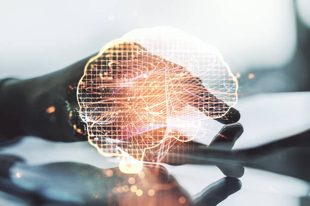 istock Double exposure of creative human brain microcircuit and hand working with a digital tablet on background. Future technology and AI concept 2185345006