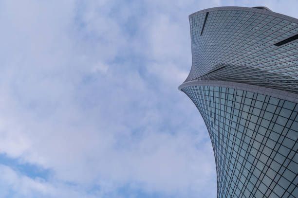 istock Skyscrapers in business district against blue sky. 2185346630