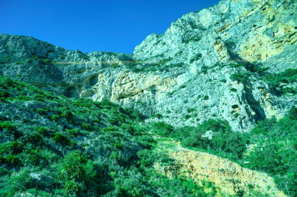 Detail of rocks forming mountains between Alicante City and Benidorm, Spain