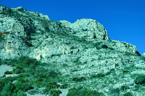 Detail of rocks forming mountains between Alicante City and Benidorm, Spain