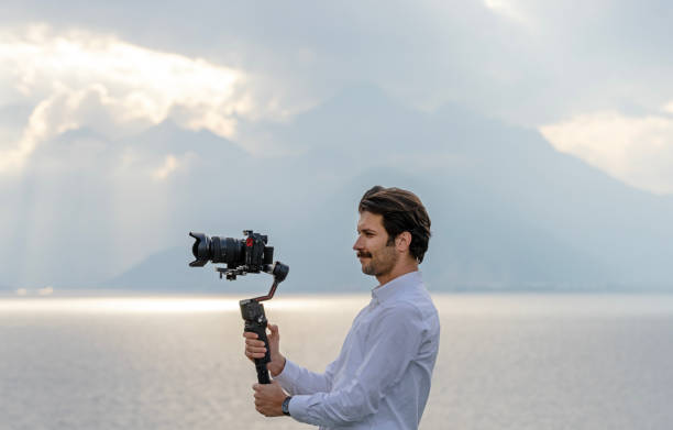 istock Videographer filming cityscapes with gimbal 2185349391
