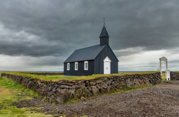 istock Black church of Budir under a cloudy sky. 2185349423