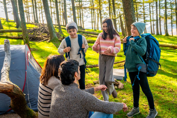 istock Family meeting during a camping weekend in the forest 2185349914