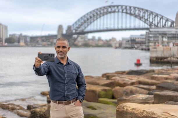 istock Tourist Taking a Selfie by the Sydney Harbour Bridge 2185351858