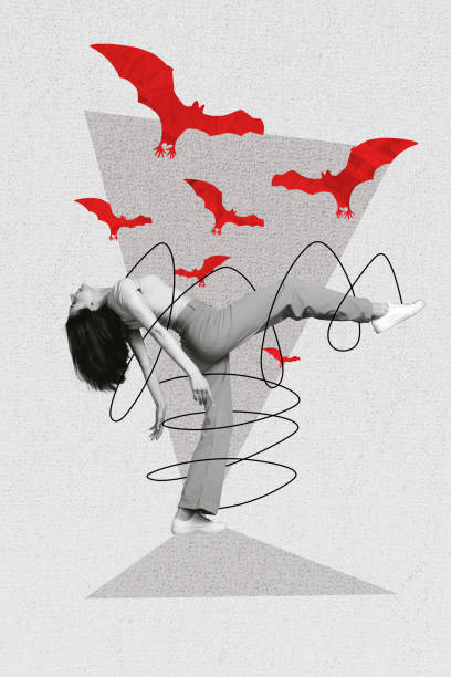 istock Vertical collage image of black white effect dancing girl tied string flying red bats isolated on  painted grey background 2185353118