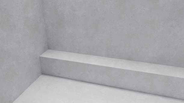 istock minimalist interior showcases a room with smooth gray concrete walls and a simple bench that creates a calming atmosphere for relaxation or creativity during various activities. 3d render 2185355490