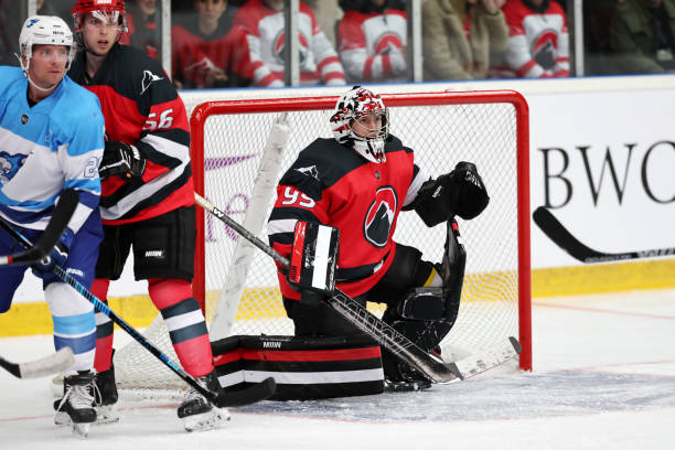 istock Ice Hockey Goalie Defending the Net 2185357656