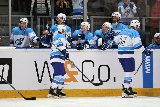 istock Team Celebration: Ice Hockey Players Rejoice at the Bench 2185357740