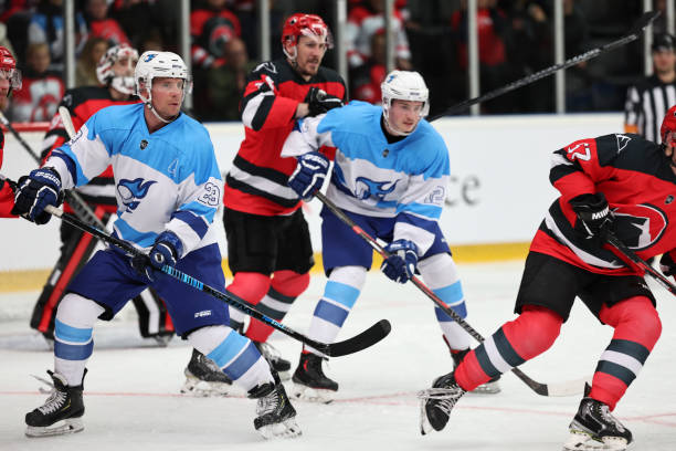 istock Ice Hockey Players Battling for Puck Control 2185357779