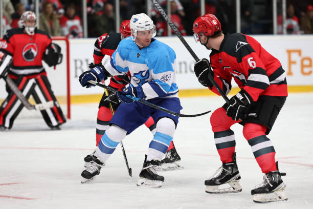 istock Ice Hockey Challenge: Players Contend Near the Goal 2185357800