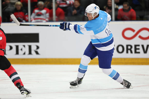 istock Ice Hockey Player in Action: Powerful Shot 2185357802