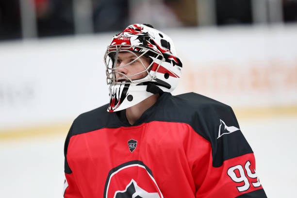 Ice Hockey Goalie in Red: Ready for Action