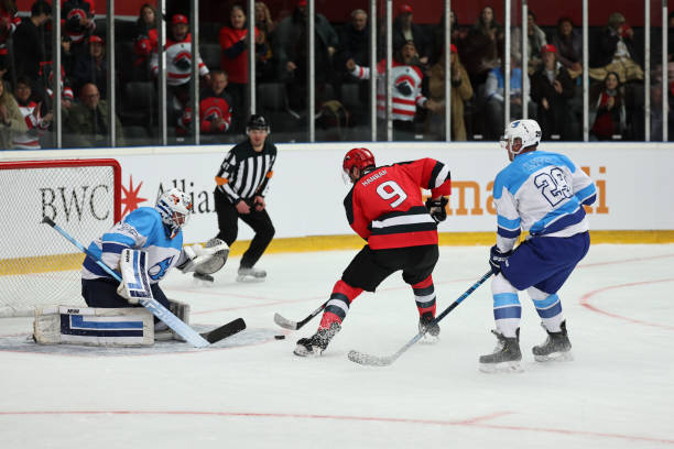 istock Intense Ice Hockey Goal Attempt 2185357894