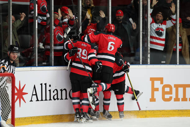 istock Red Team Celebrates Goal with Fans 2185357922