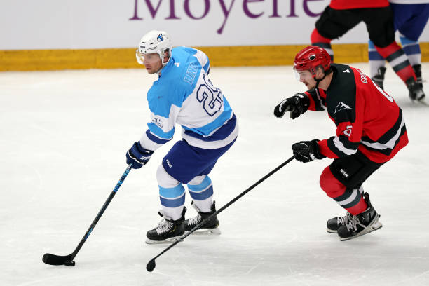 istock Ice Hockey Players in High-Stakes Action 2185357934