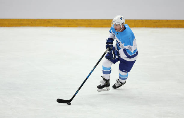 istock Focused Ice Hockey Player Maneuvering the Puck 2185357947
