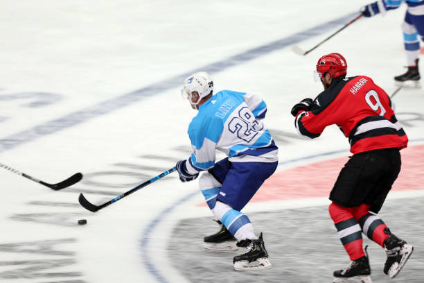 istock Intense Hockey Action Between Two Players 2185357974