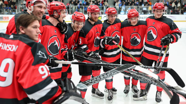 istock Smiling Ice Hockey Team in Red Jerseys 2185358090