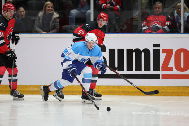 istock Intense Ice Hockey Duel in Action 2185358174