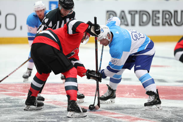 istock Faceoff During Intense Hockey Match 2185358182