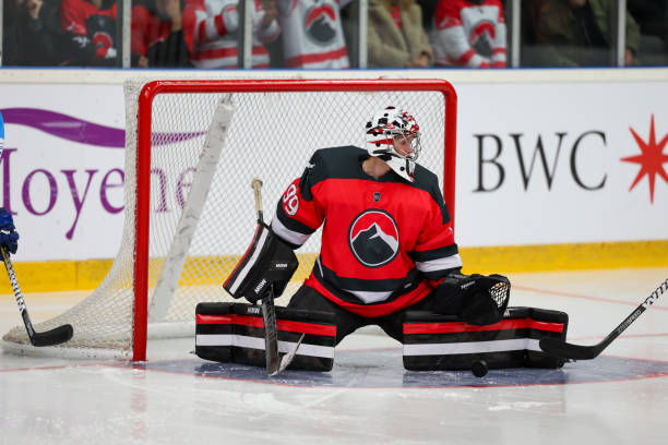 istock Goalie in Position During Intense Hockey Match 2185358193
