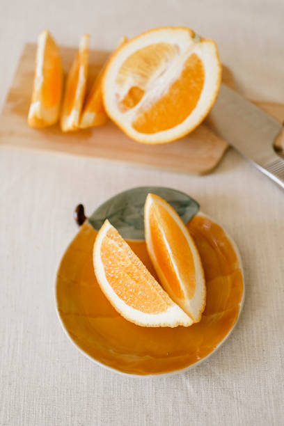 istock Orange slices on fruit plate simplicity of healthy eating 2185358853