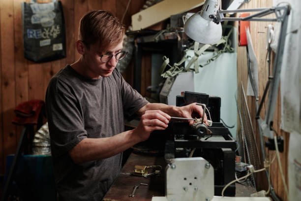 istock Technician repairing metalwork equipment 2185358991