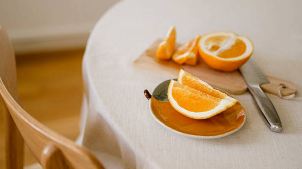 istock Orange slices on fruit plate simplicity of healthy eating 2185359025