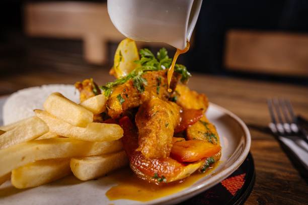 istock Chicken curry with fries and rice. 2185359222