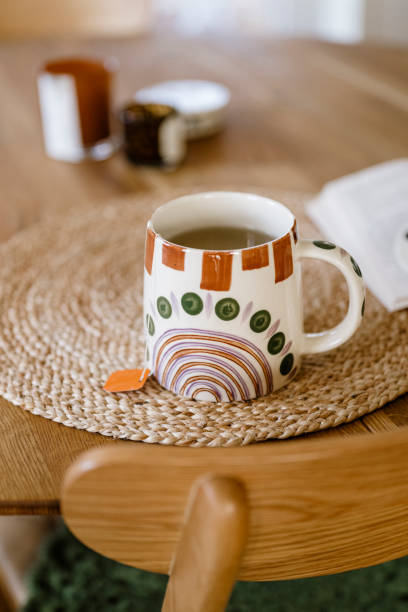 istock Cozy modern cup of tea on table 2185360351