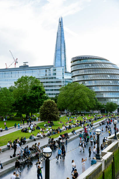 istock Crowd of people relaxing along Thames river 2185361594