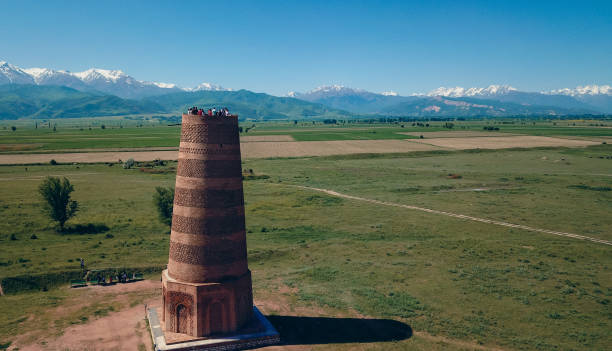 istock Kyrgyzstans ancient tower amidst stunning mountain landscape on a clear day 2185362432