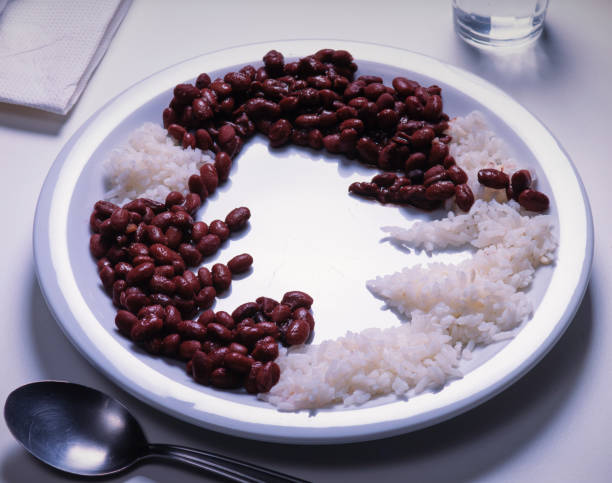 istock Christmas tree shaped rice and beans dish on plate 2185364948