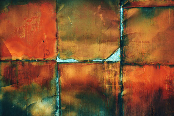 Worn corroded rusty metal plates as grunge background and texture