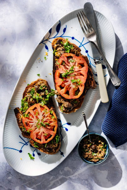 istock Beefsteak Tomatoes with Black Olive and Orange Tapenade 2185367672