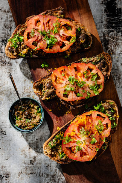 istock Beefsteak Tomatoes with Black Olive and Orange Tapenade 2185367774