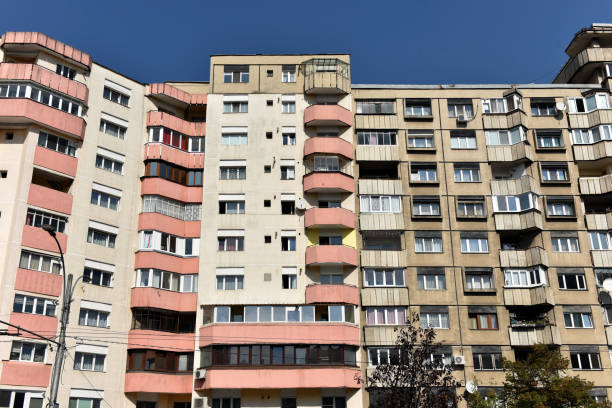 istock Typical facade of concrete panel building. Post Soviet flat of blocks 2185370232