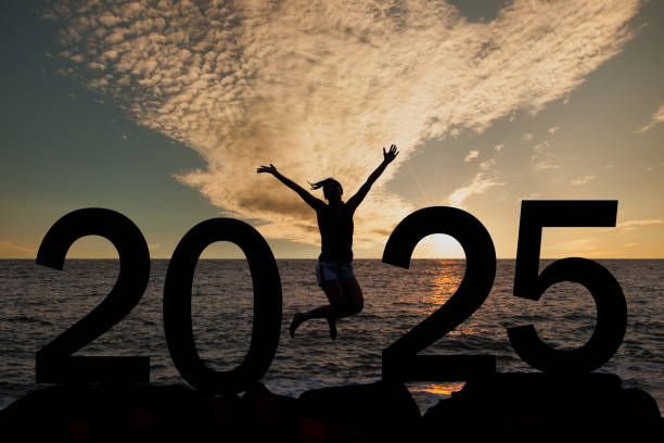 istock Woman enjoying and 2025 years while celebrating new year 2185370306
