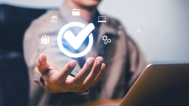 istock Quality management with Quality Assurance or QA and Quality Control or QC and improvement. Standardization, certification concept. Compliance to regulations and standards. Concept with manager. 2185373757