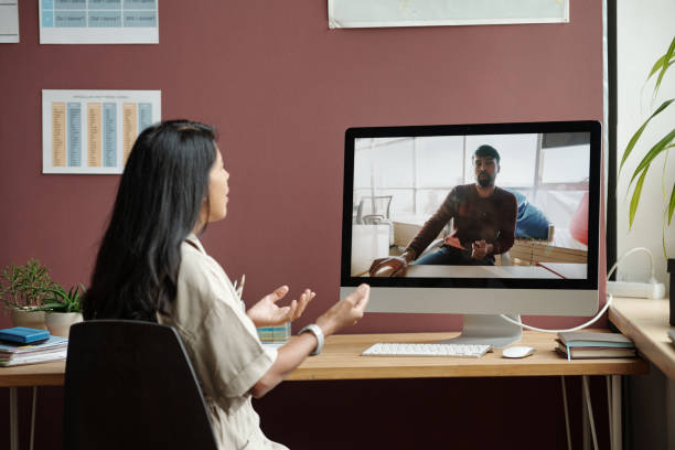 istock Having online lesson with male student 2185374198