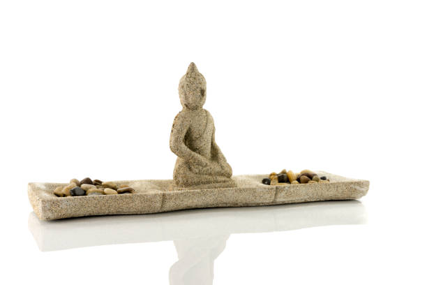 istock plate with stones  and budha in balance 2185374618