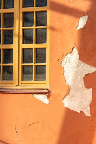 istock Old paint on the wall of the house 2185375341