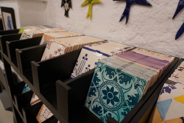 istock Displayed decorative ceramic tiles in a store, showcasing various designs. 2185377765