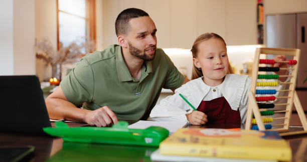 istock Homework, father and girl with abacus, help and education with elearning, support and learning. Development, happy family and parent or dad, daughter and computer for studying, knowledge or counting 2185380339