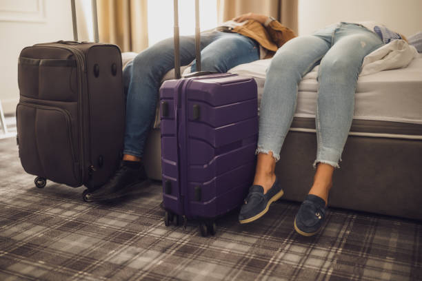 istock Tourists in hotel room 2185384131