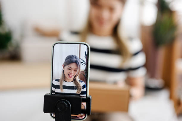 istock Lights, Camera, Unbox: Asian Influencer’s Special Gift 2185385134