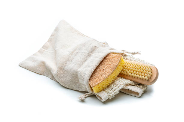 Eco friendly cleaning equipment: cleaning sponge, scrubbing brus and rag isolated on white background. High resolution 42Mp studio digital capture taken with Sony A7rII and Sony FE 90mm f2.8 macro G OSS lens
