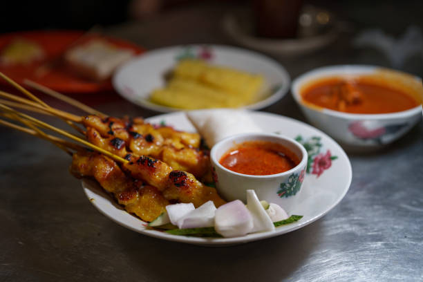 istock Traditional Satay with Peanut Sauce and Side Dishes 2185386219