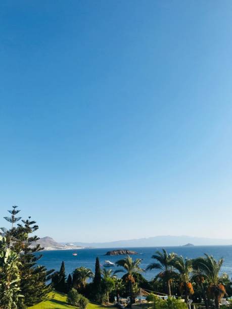 istock Scenic coastal view with ocean horizon and lush greenery. Bodrum, Turkey. 2185393736